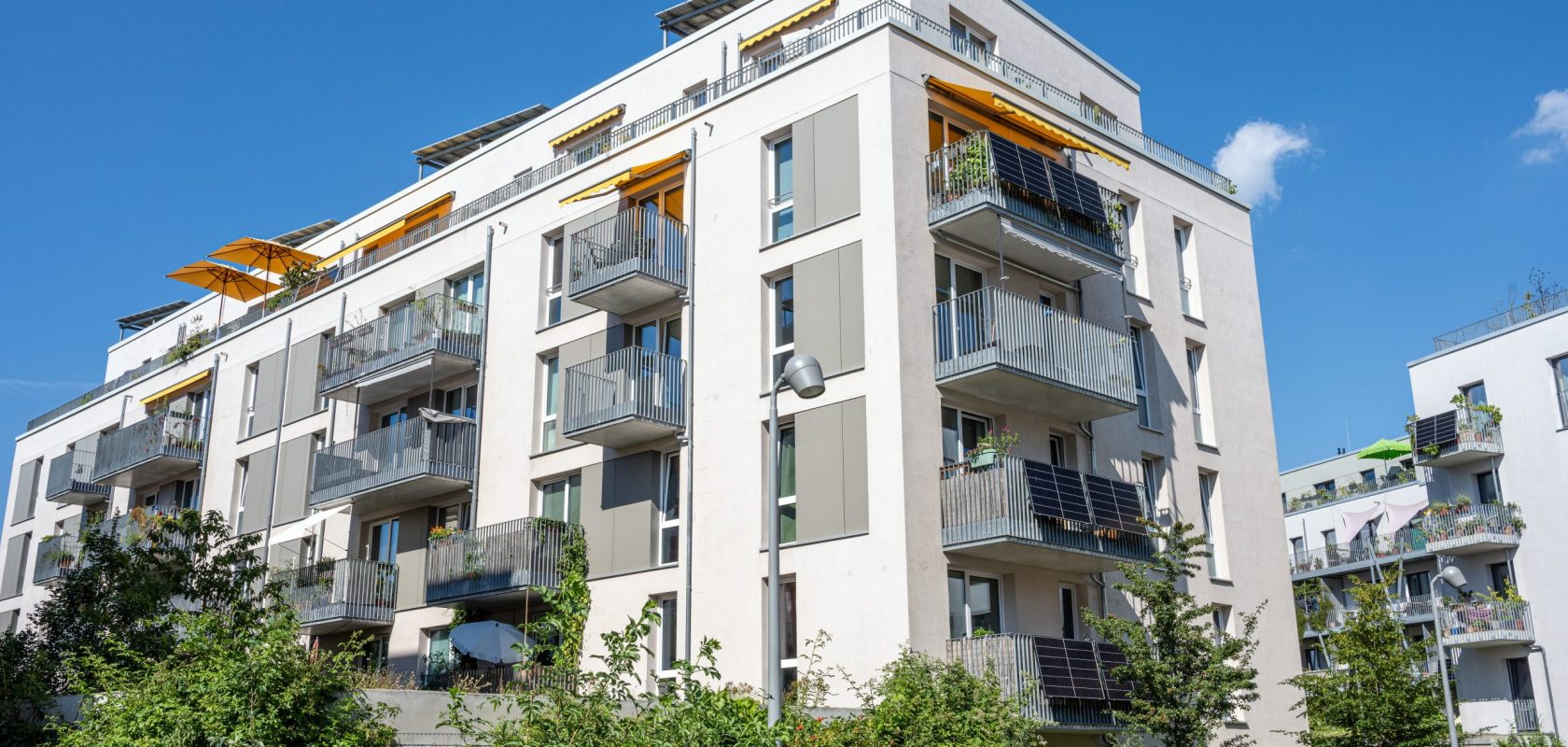 new-white-apartment-building-2025-03-05-11-27-56-utc